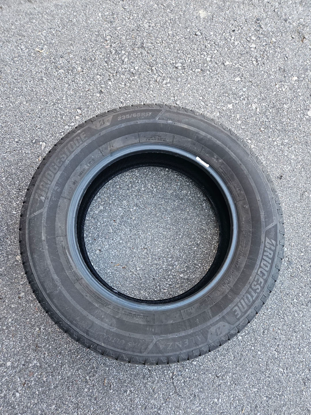 Pair of like New Bridgestone All-Weather Tires-235/65R17 - photo 5