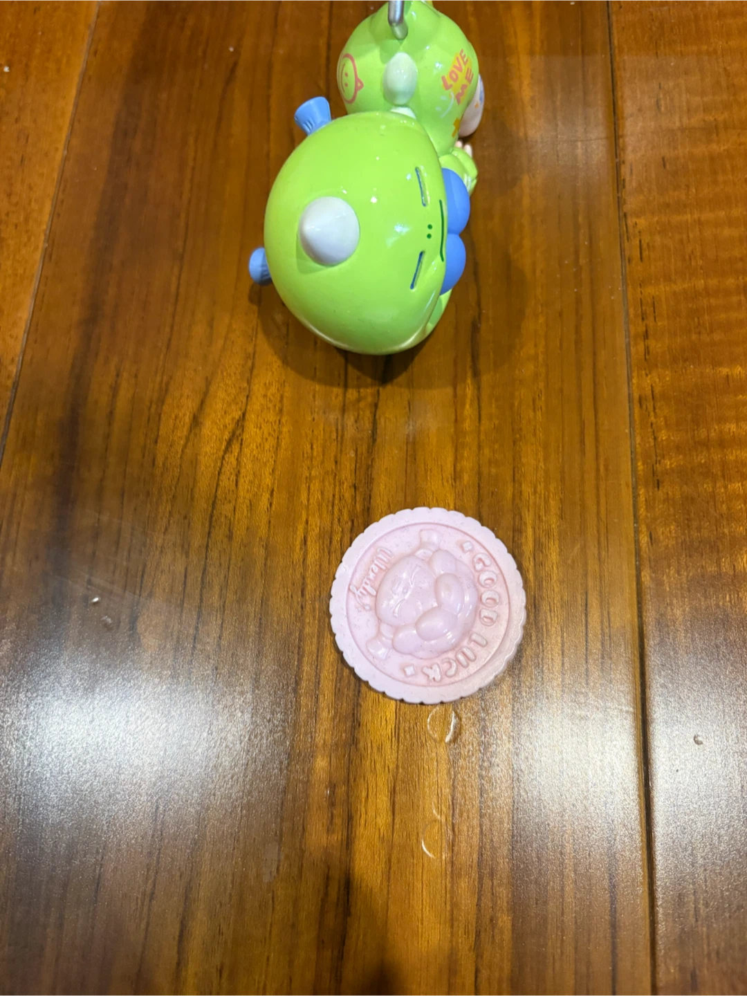 Green Character Figure with Pink Round Accessory - photo 4