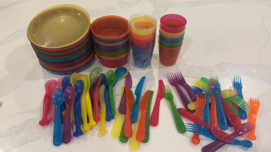 Assorted Plastic Plates, Bowls, Cups, and Cutlery Set