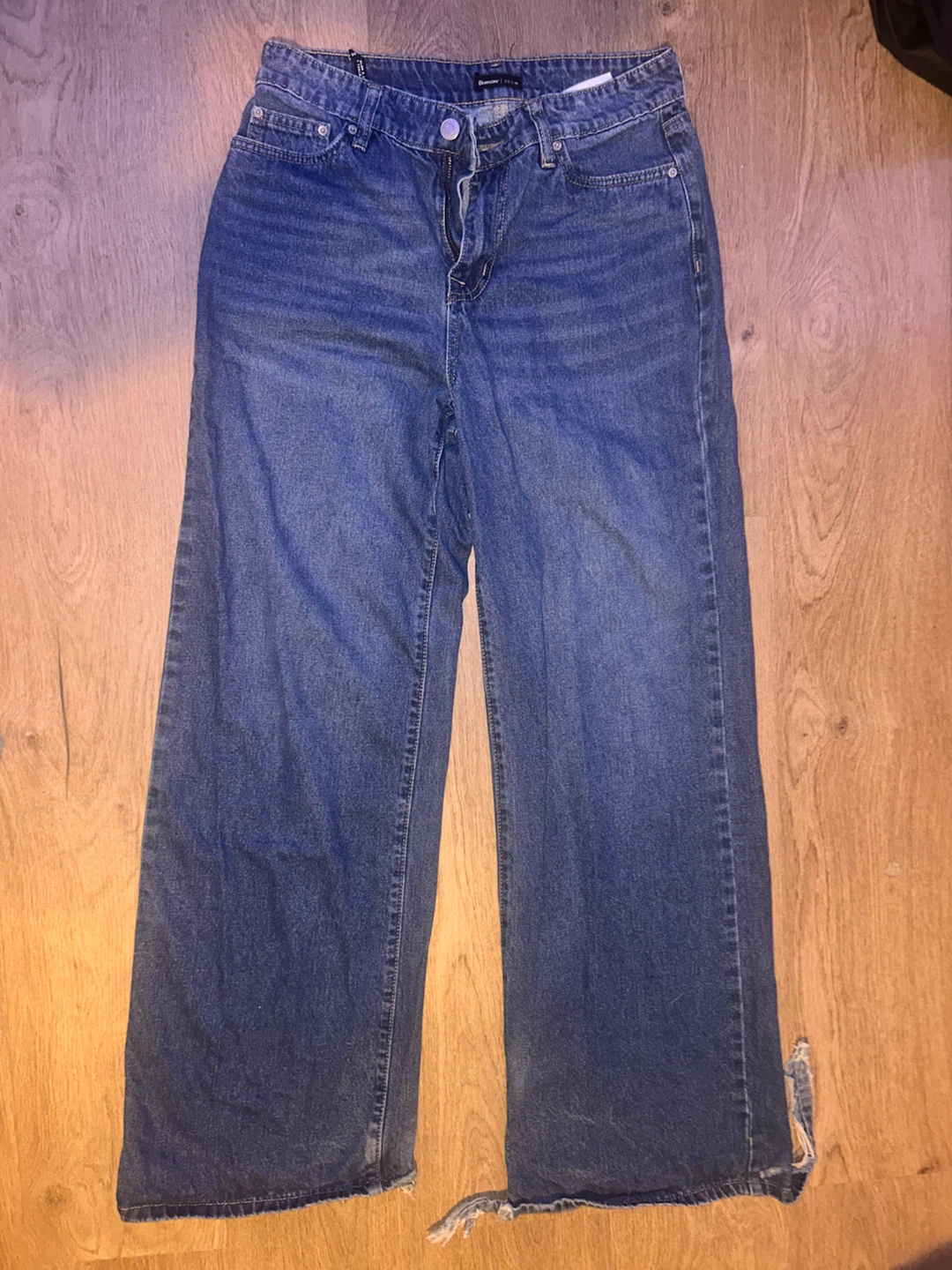 Wide leg blue jeans with DIY hand prints