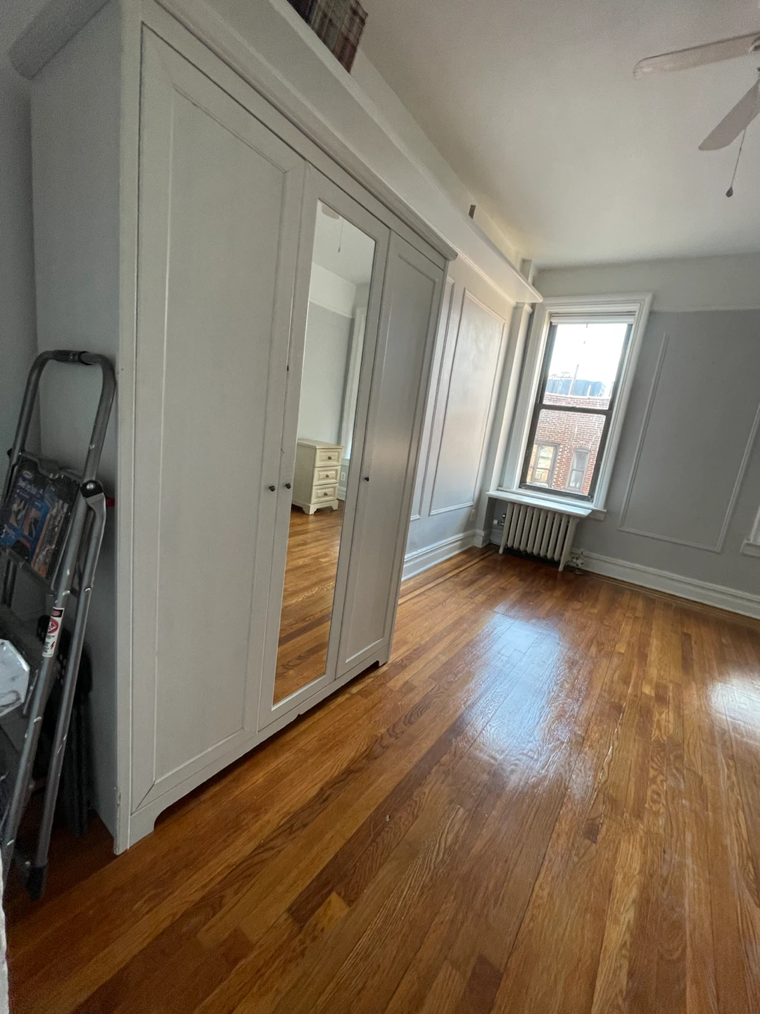 Three Door White Armoire with Full Length Mirror