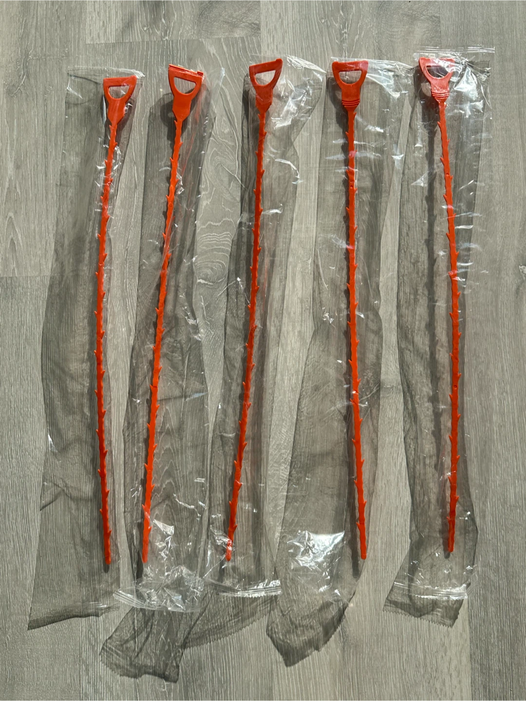 5 Orange Drain Cleaning Tools