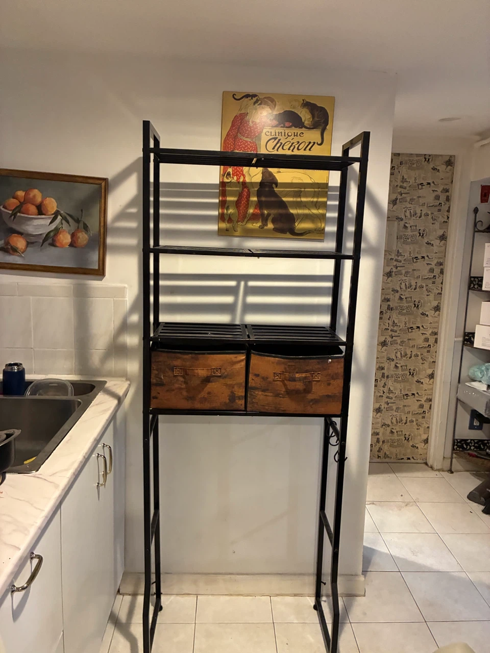 Tall metal shelving unit with wood-look bins