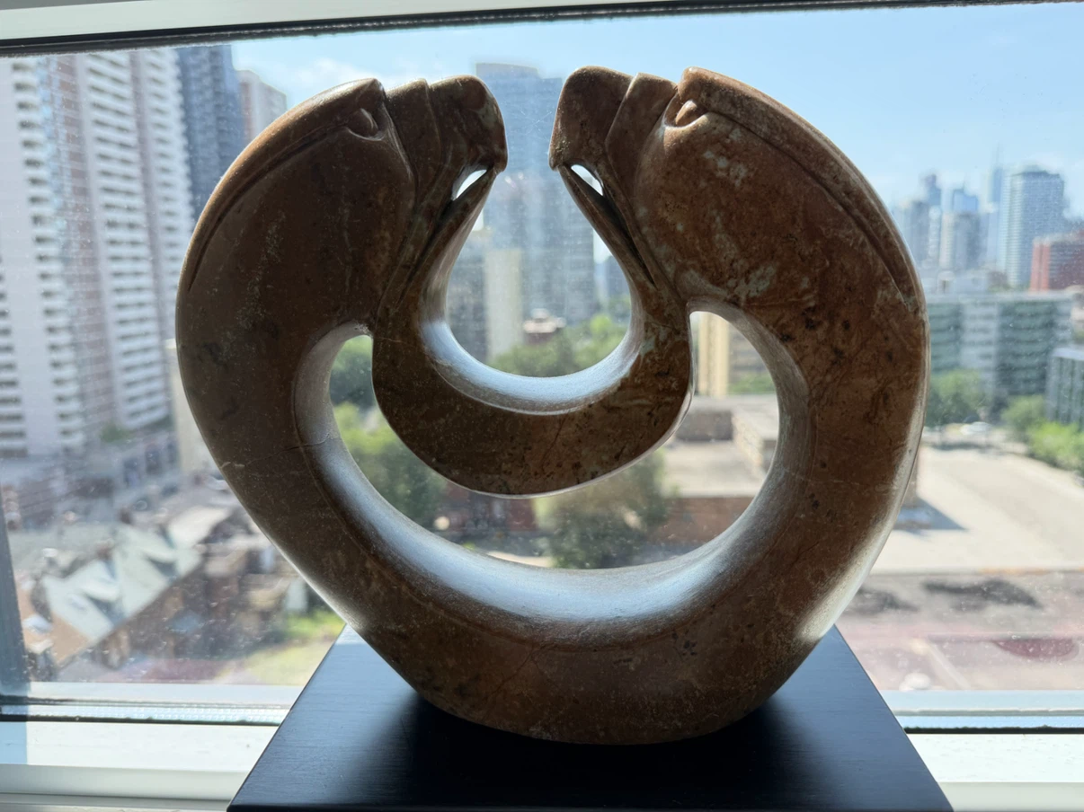 Indigenous Stone Sculpture on Black Base - photo 2