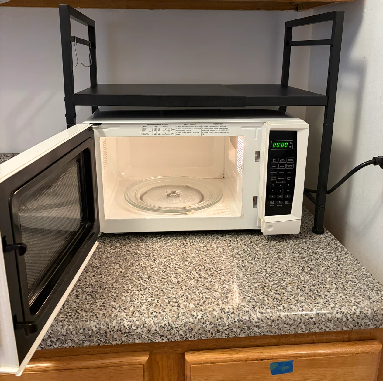 Insignia 700w Microwave + Overtop Storage Organizer - photo 2