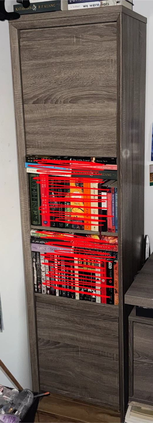 Narrow wooden bookshelf