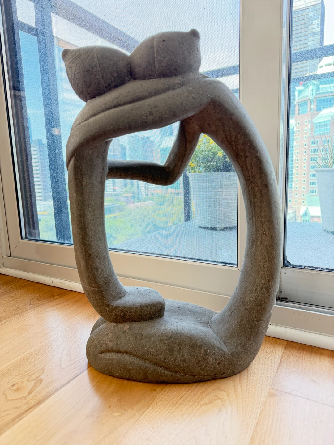 Abstract Stone Hugging Sculpture