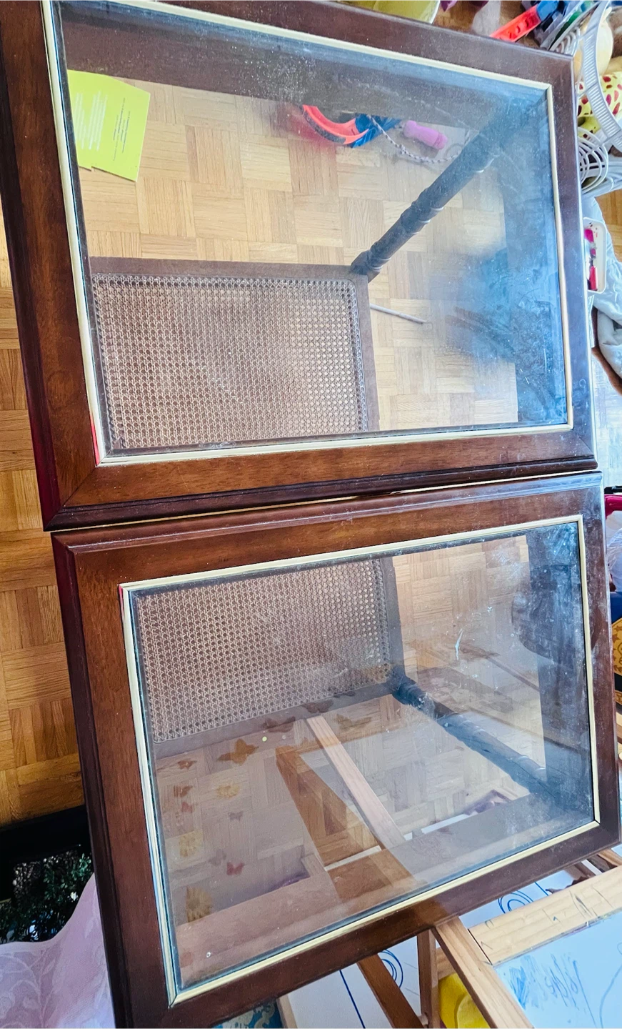 Wooden side table with glass top and cane shelves
