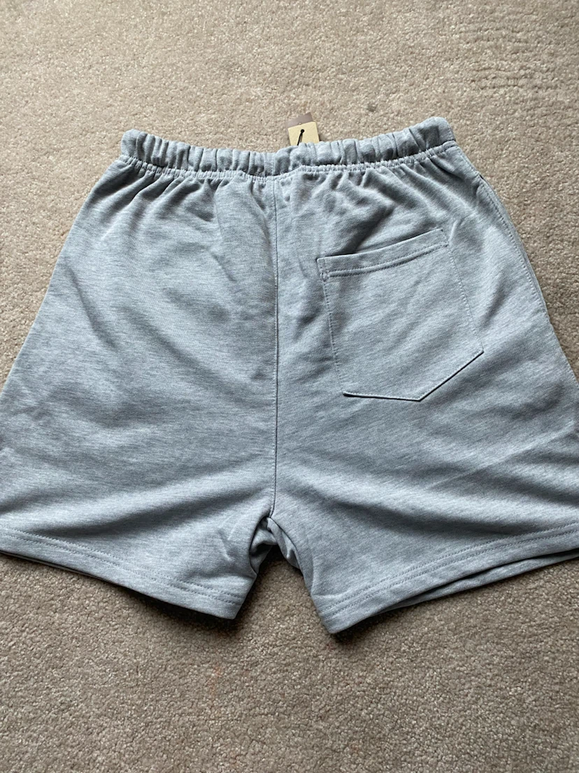 ESSENTIALS Fear of God shorts Black and Light Grey - photo 3