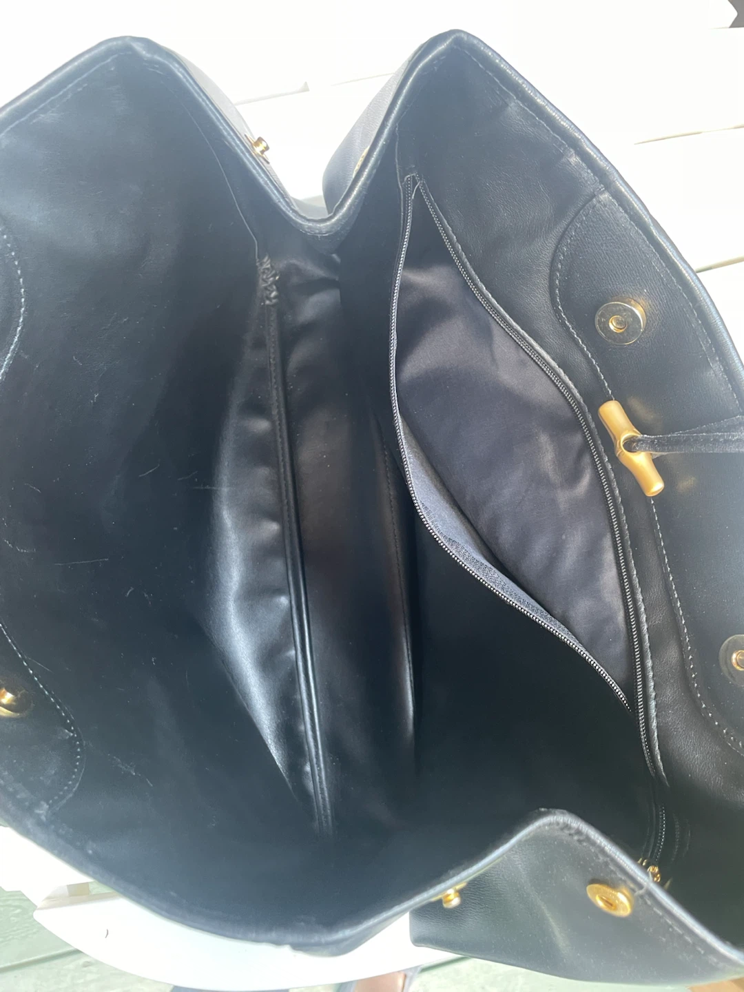 Longchamp black leather tote bag.