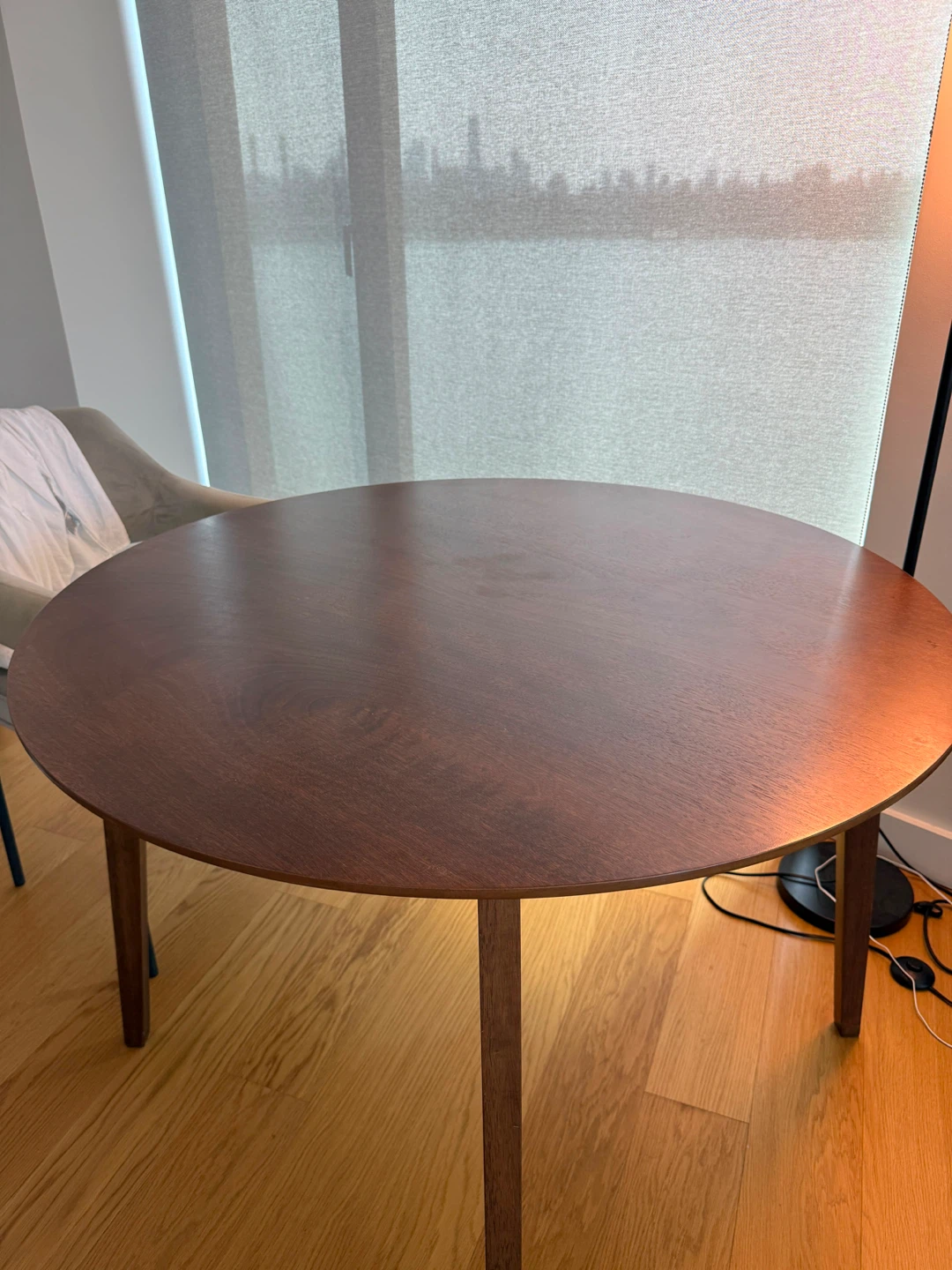 Round walnut dining table