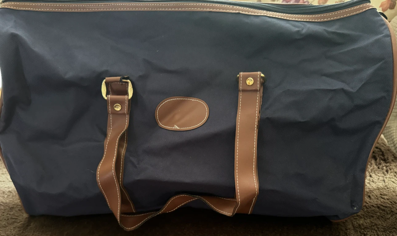 Navy Blue Duffle Bag with Brown Leather Accents