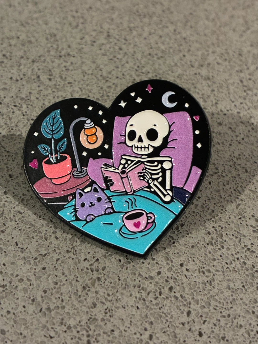Skeleton reading Heart Enamel Pin