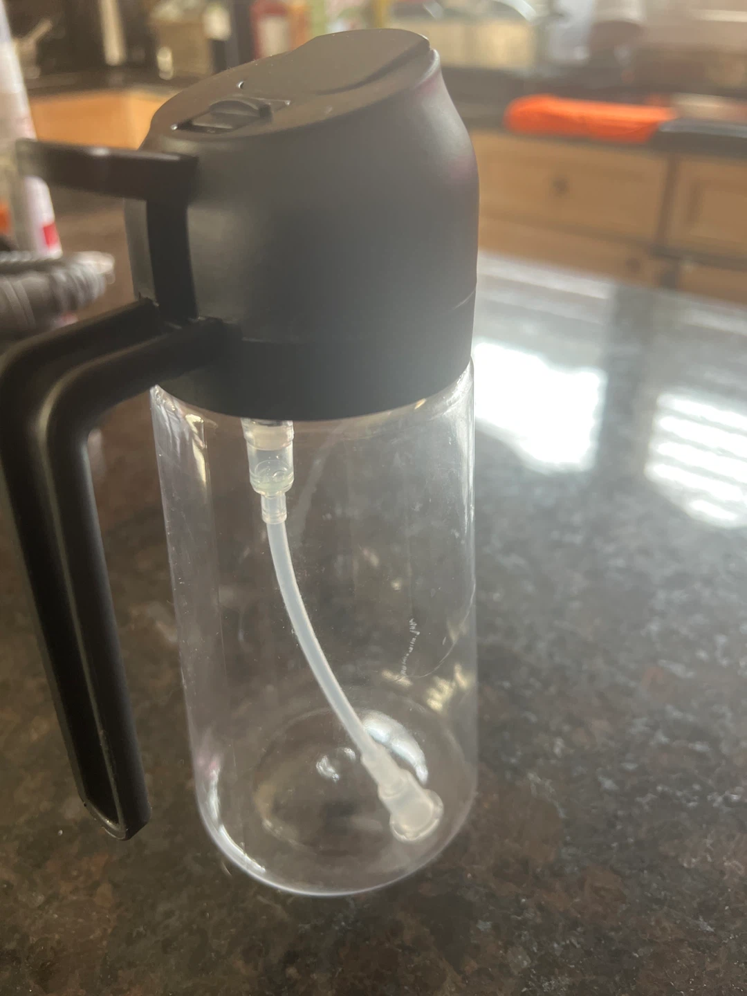 Clear Spray Bottle with Black Handle