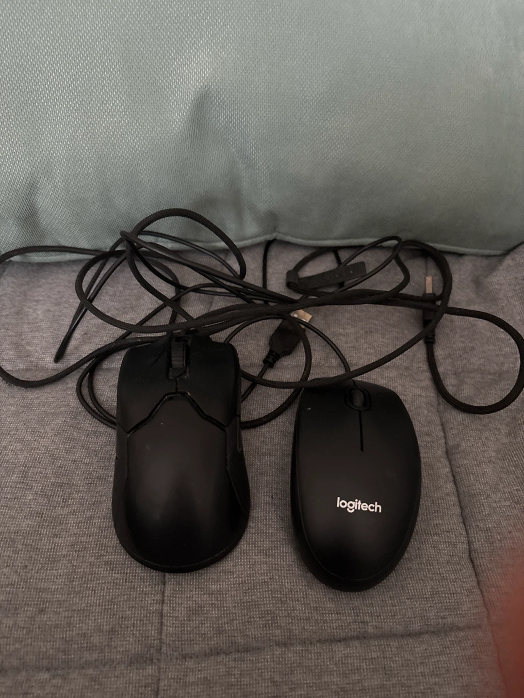 Logitech and other black computer mice