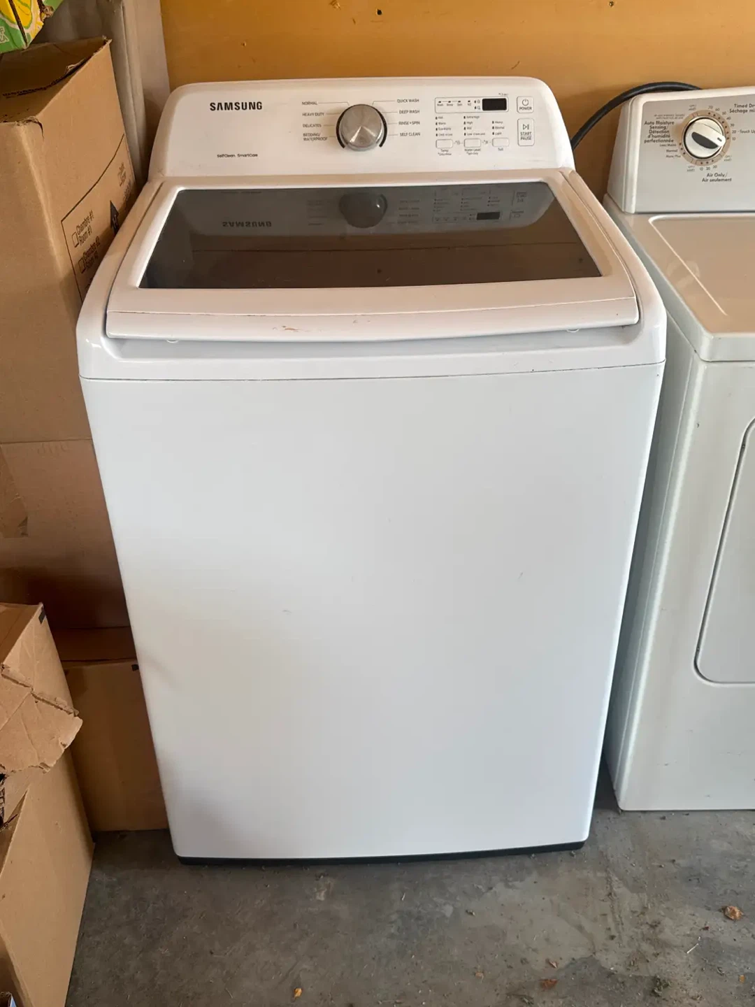 Whirlpool Electric Dryer and digital Samsung top load washer