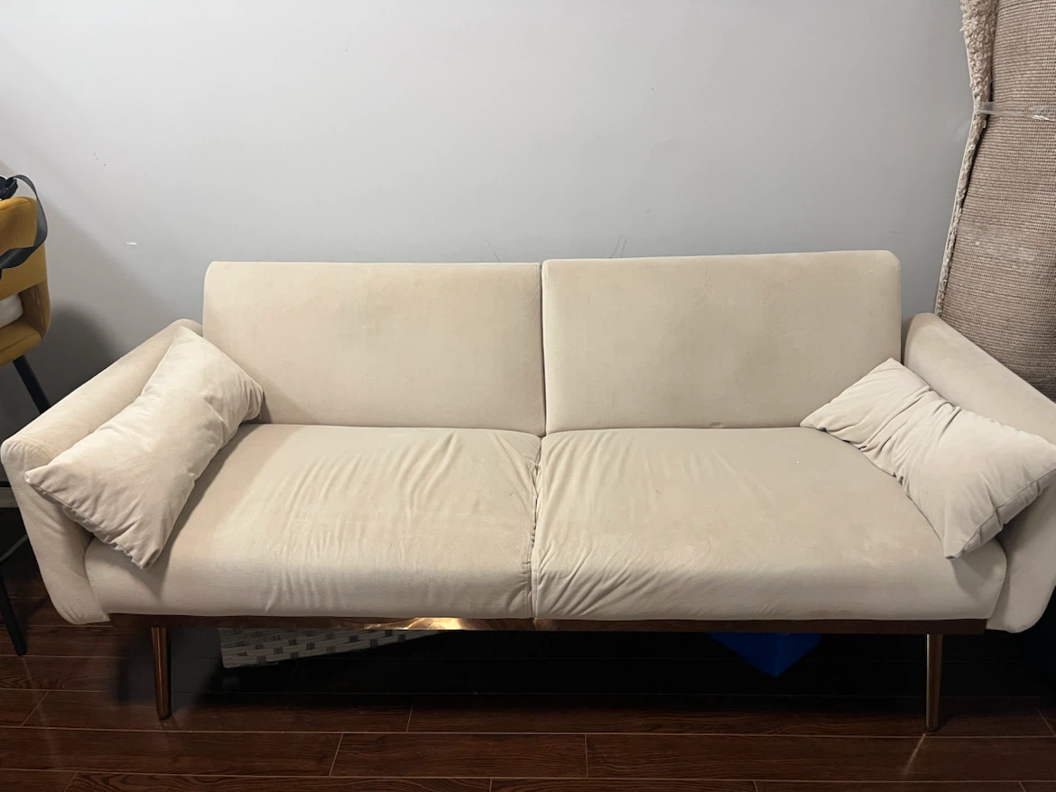Small Beige Sofa Bed with Pillows