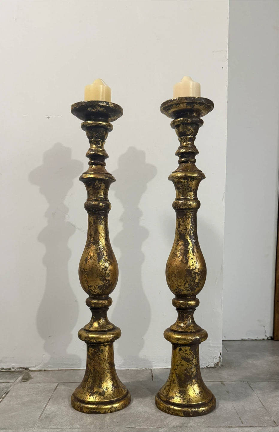 Pair of Oversized Distressed Gold Floor Candle Holders