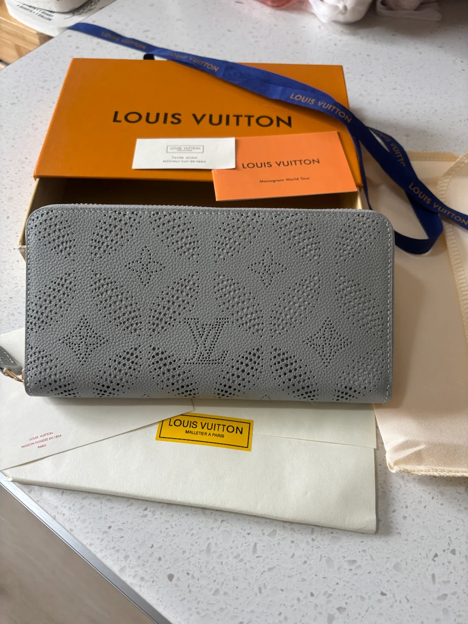Louis Vuitton Grey Perforated Zip-Around Wallet