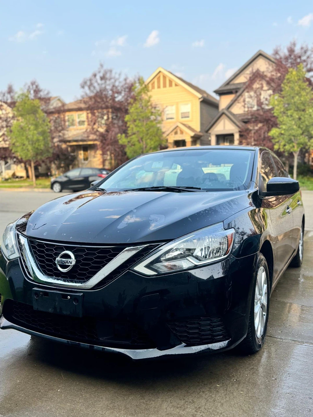 Black Nissan Sentra SV Sedan