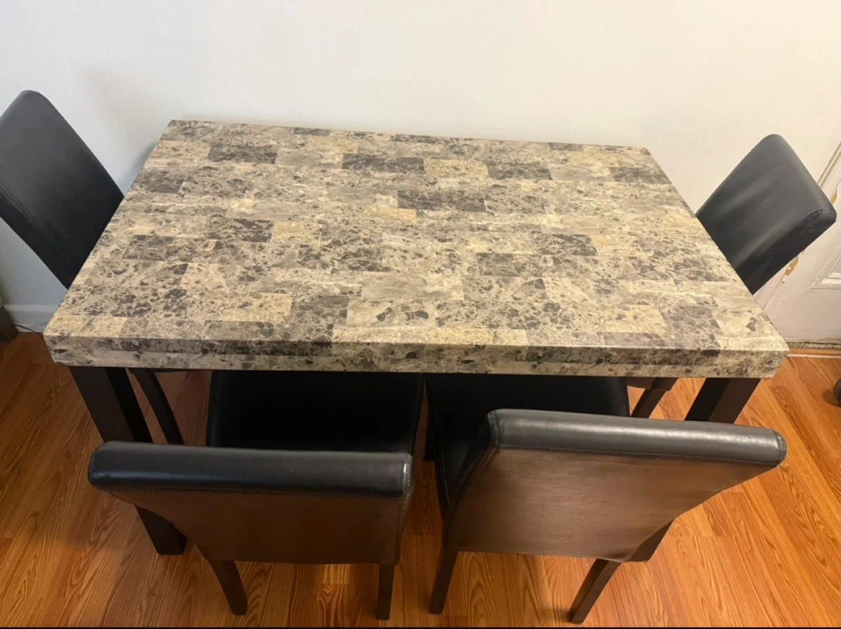4 black faux chairs