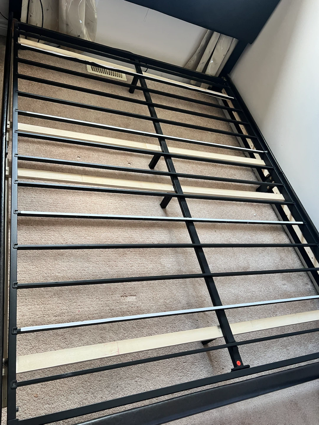 Black upholstered headboard bed frame