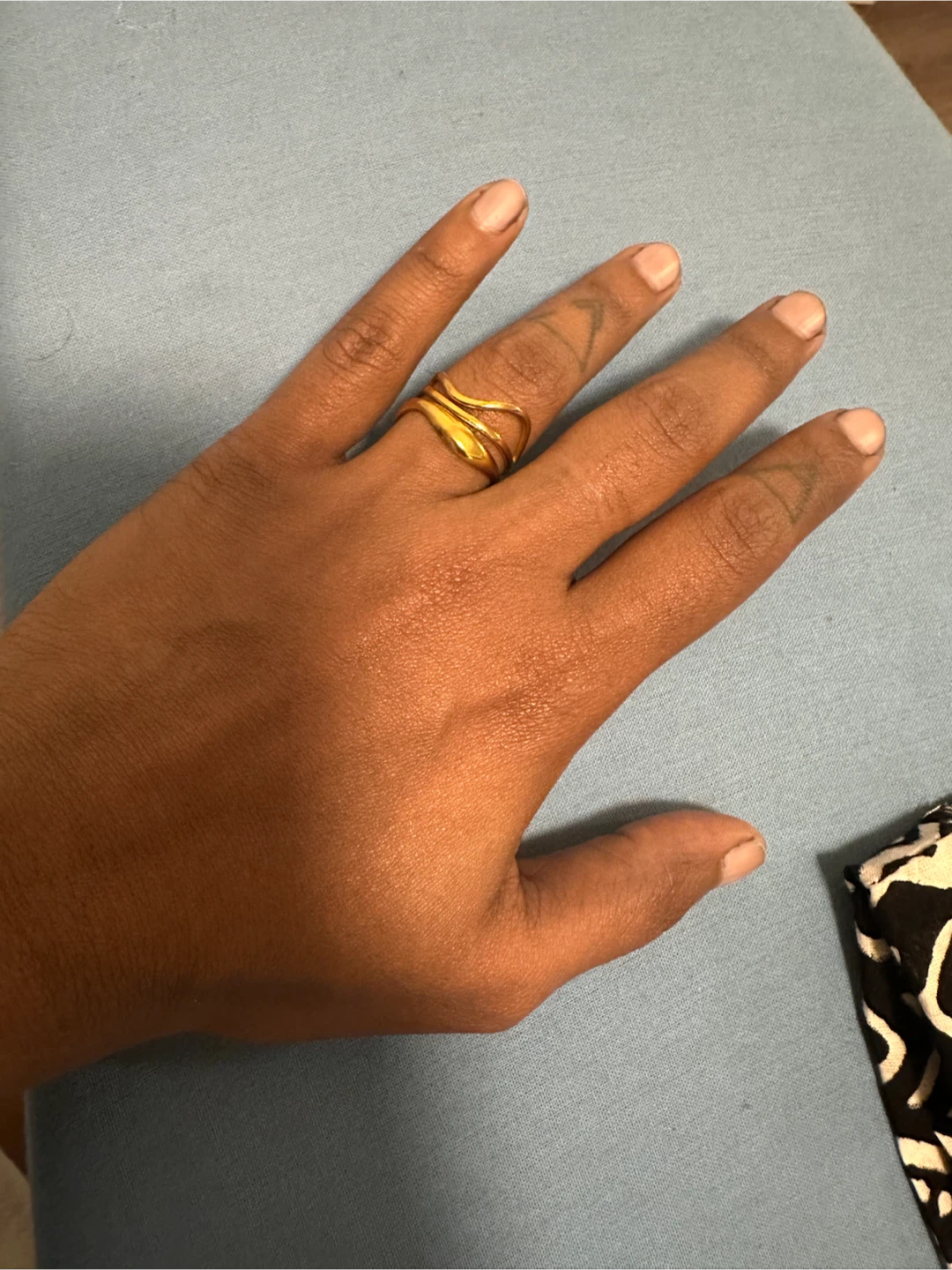 Gold tone wavy ring