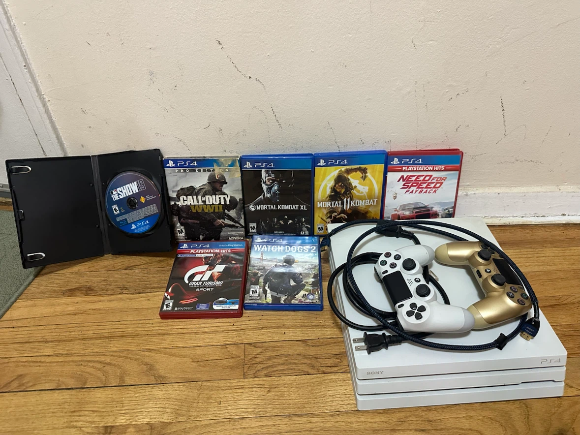 Sony PlayStation 4 Pro Console with Games & Controllers