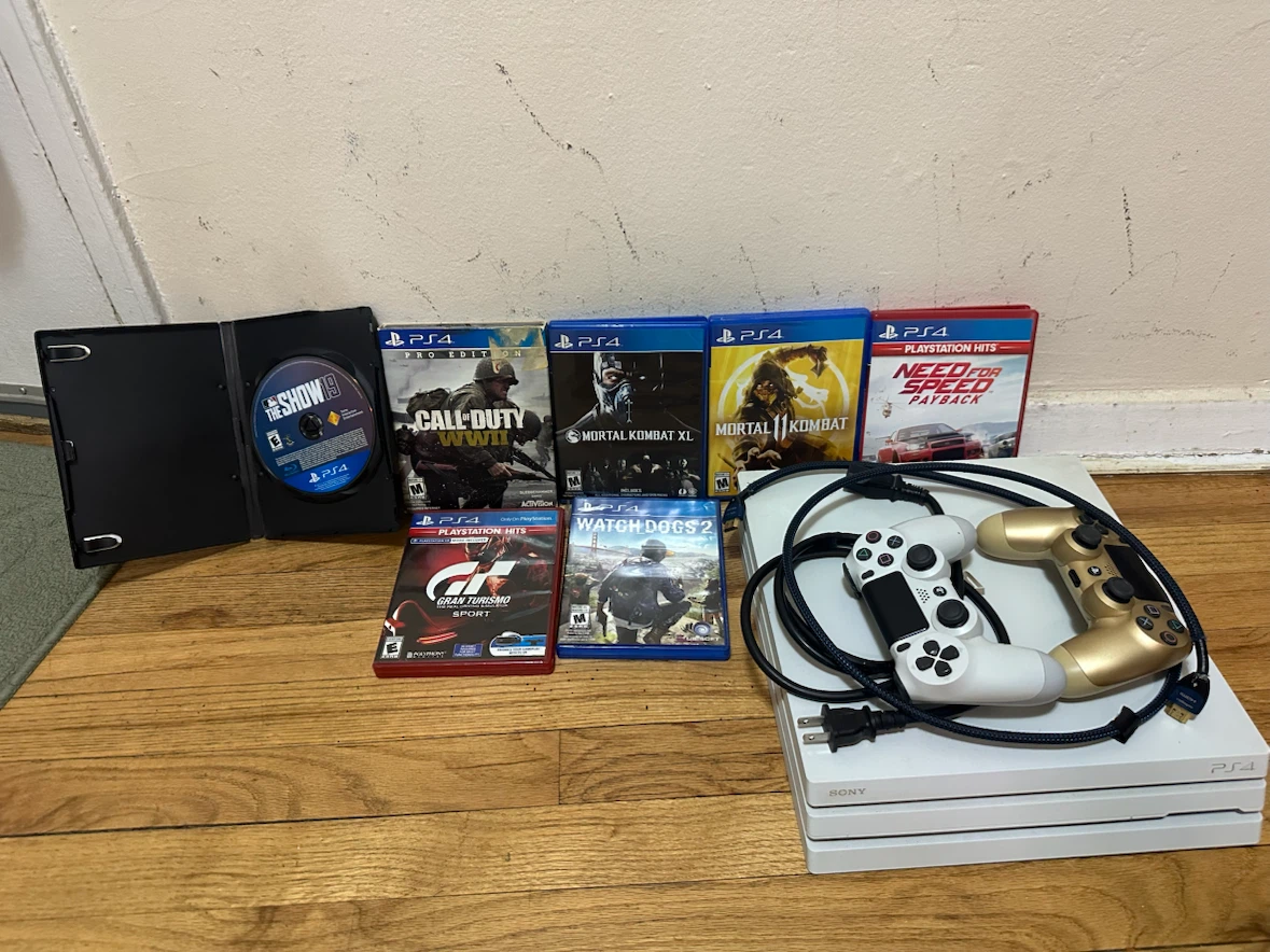 Sony PlayStation 4 Pro Console with Games & Controllers - photo 2