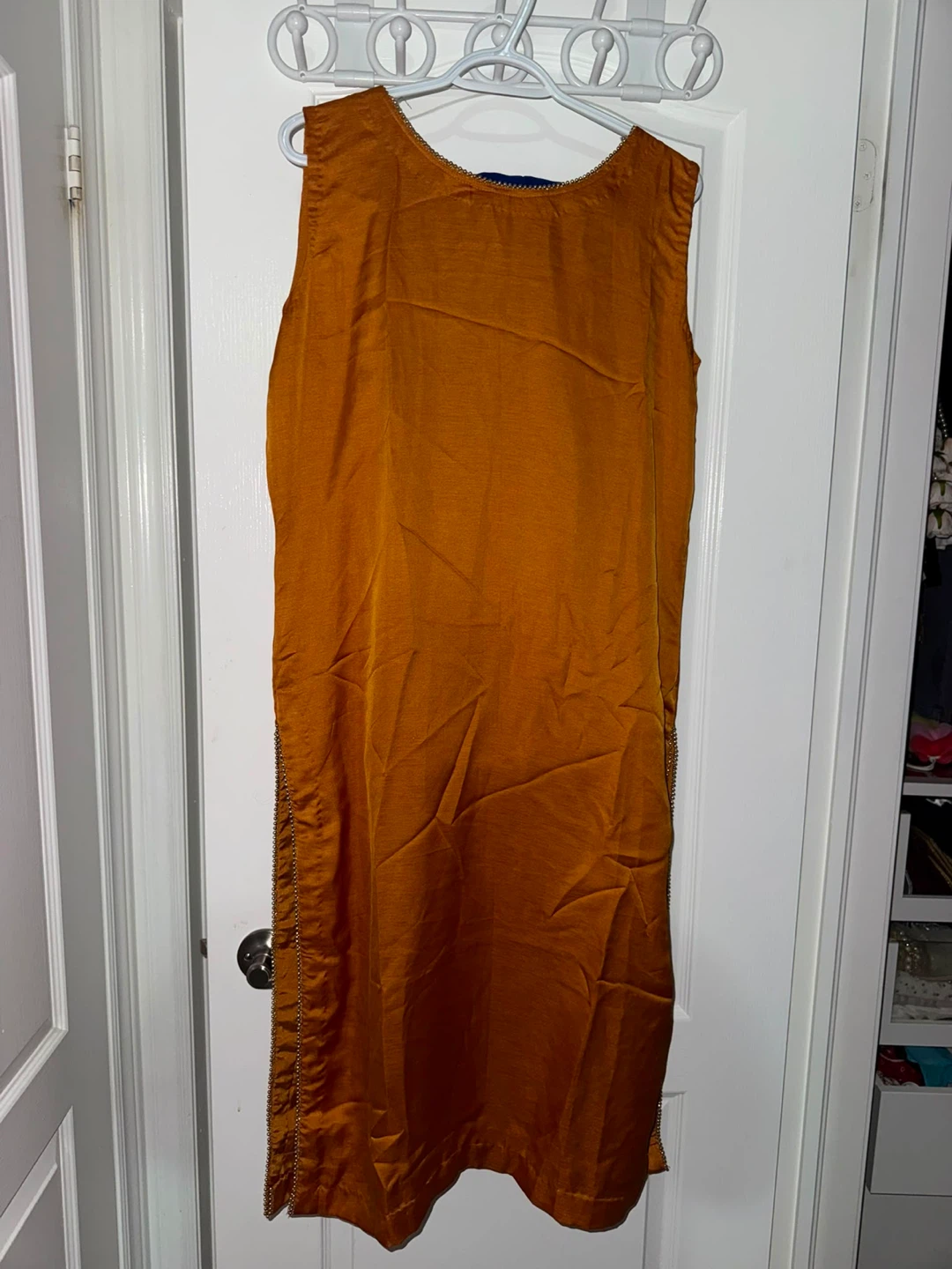 Sleeveless orange/rust Punjabi suit