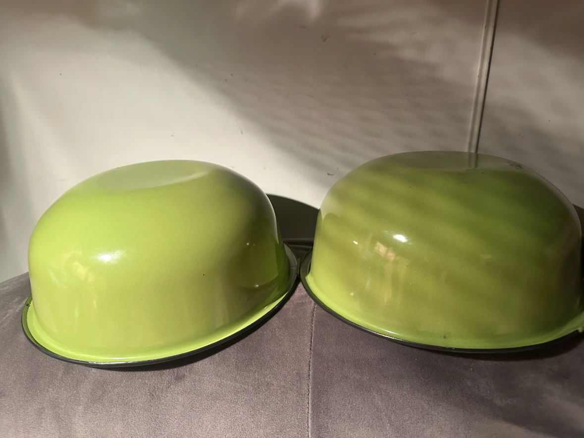 Pair of green enamel mixing bowls