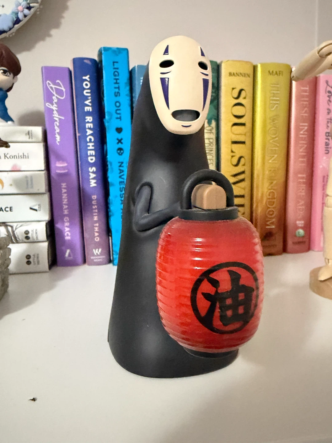 No Face Figurine with Lantern