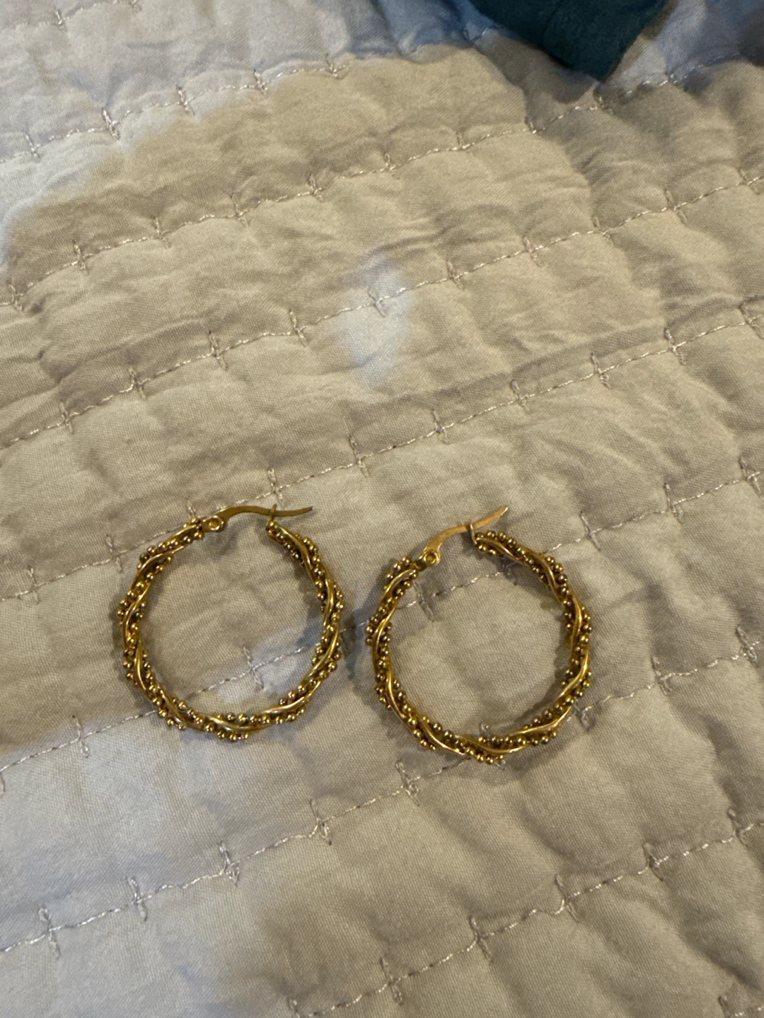 Gold Tone Twisted Hoop Earrings