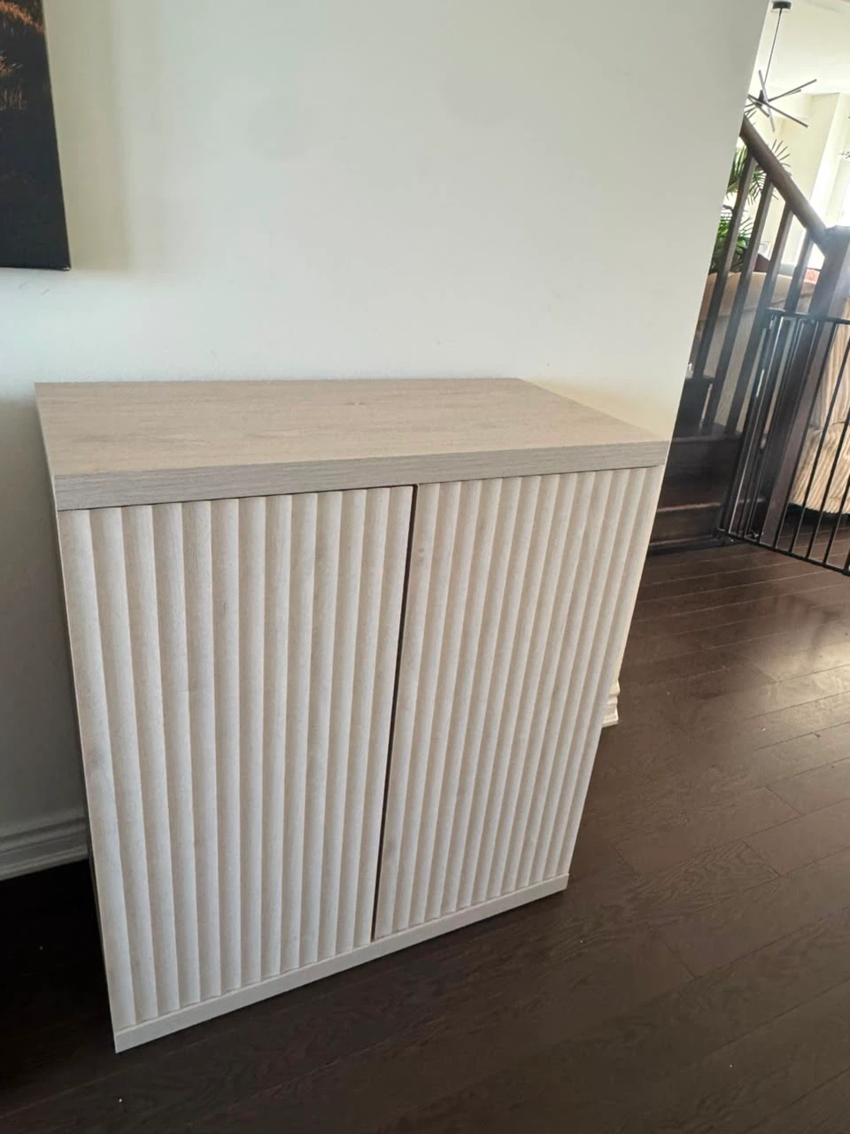 Light Wood Cabinet with Fluted Doors