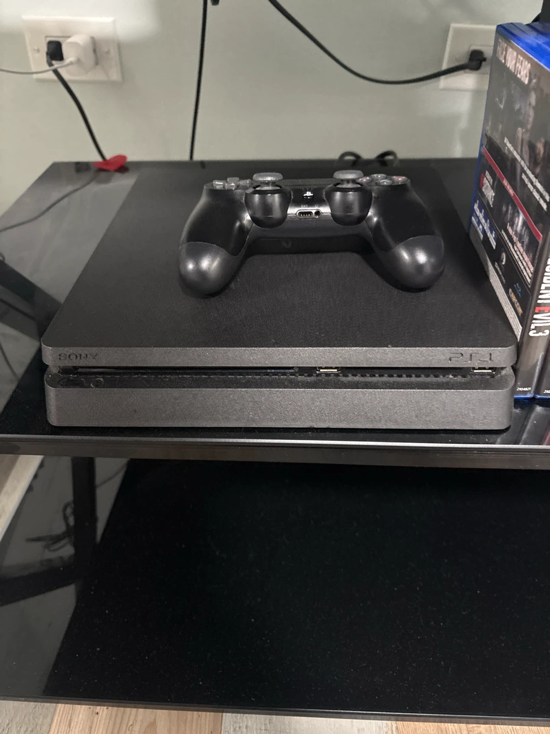 Sony PlayStation 4 Slim Console with Controller and Games