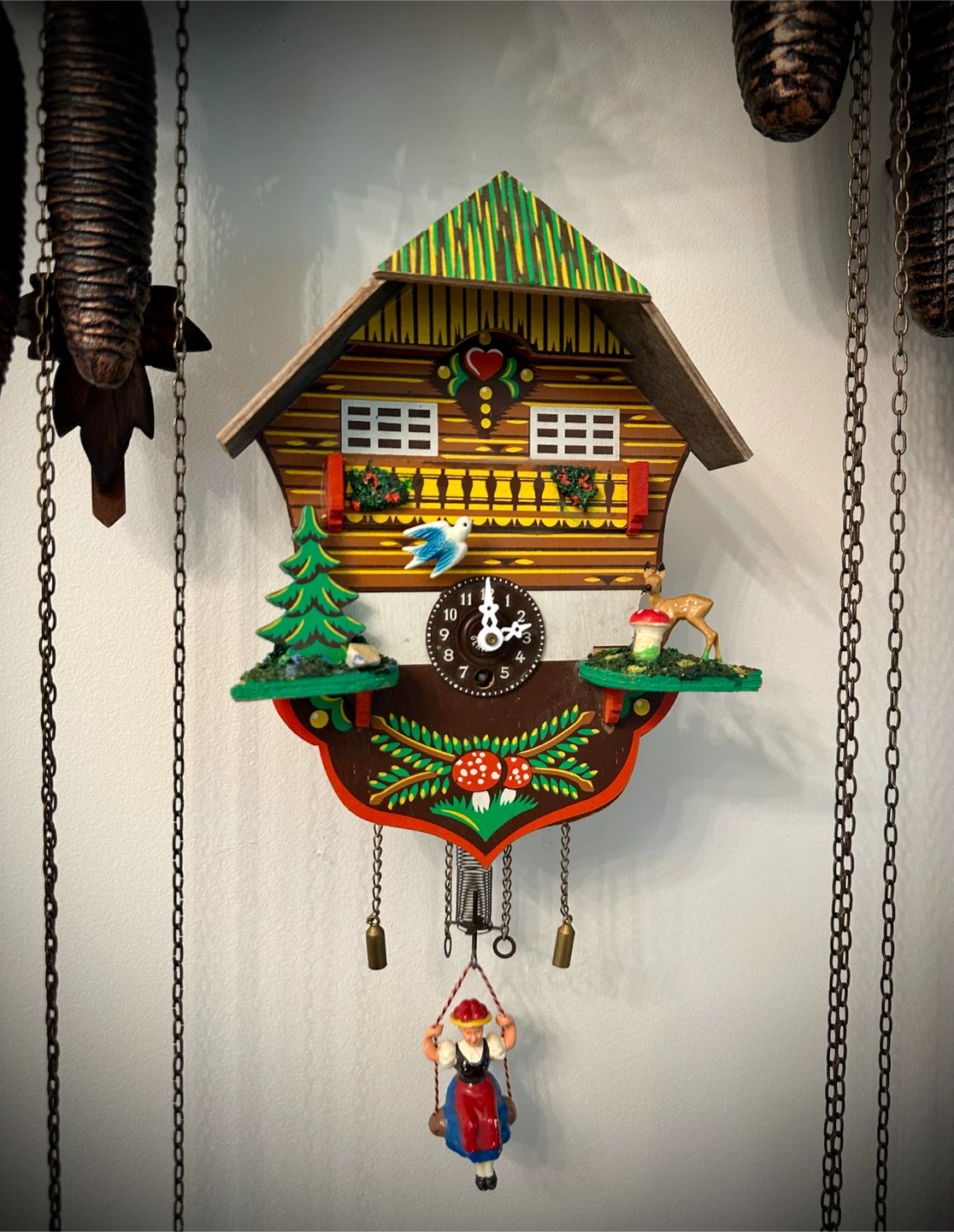 Cuckoo Clock - German chalet with swinging girl
