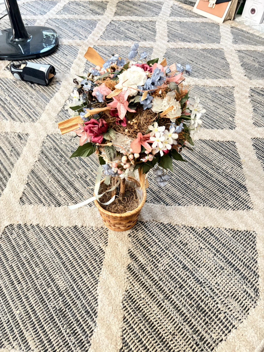 Decorative Floral Arrangement in Wicker Basket