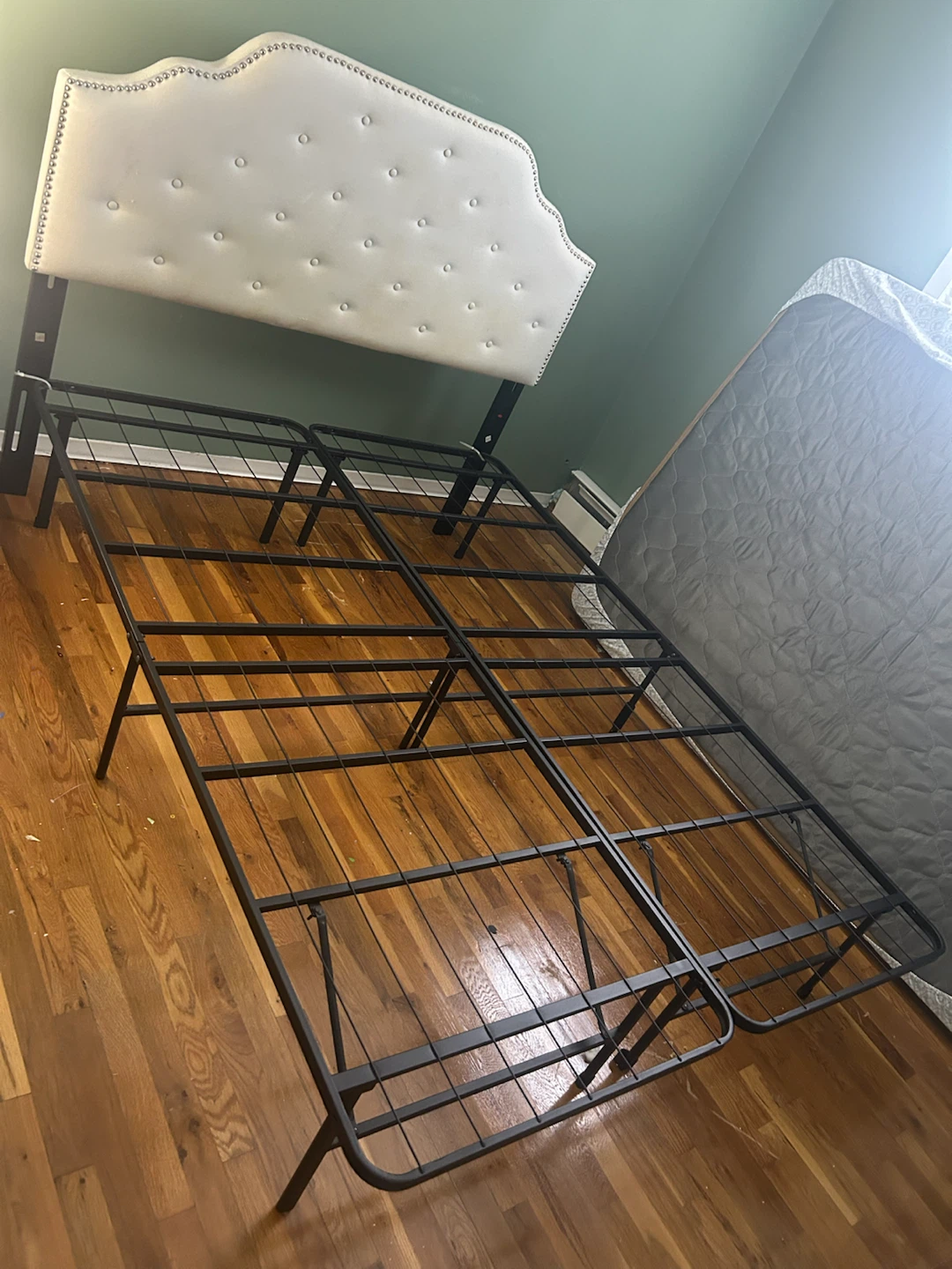 White Upholstered Headboard with Metal Bed Frame