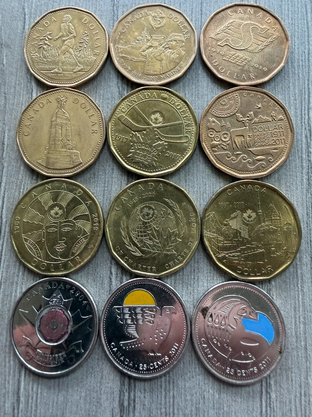 Collection of Canadian Dollars and 25 Cent Coins