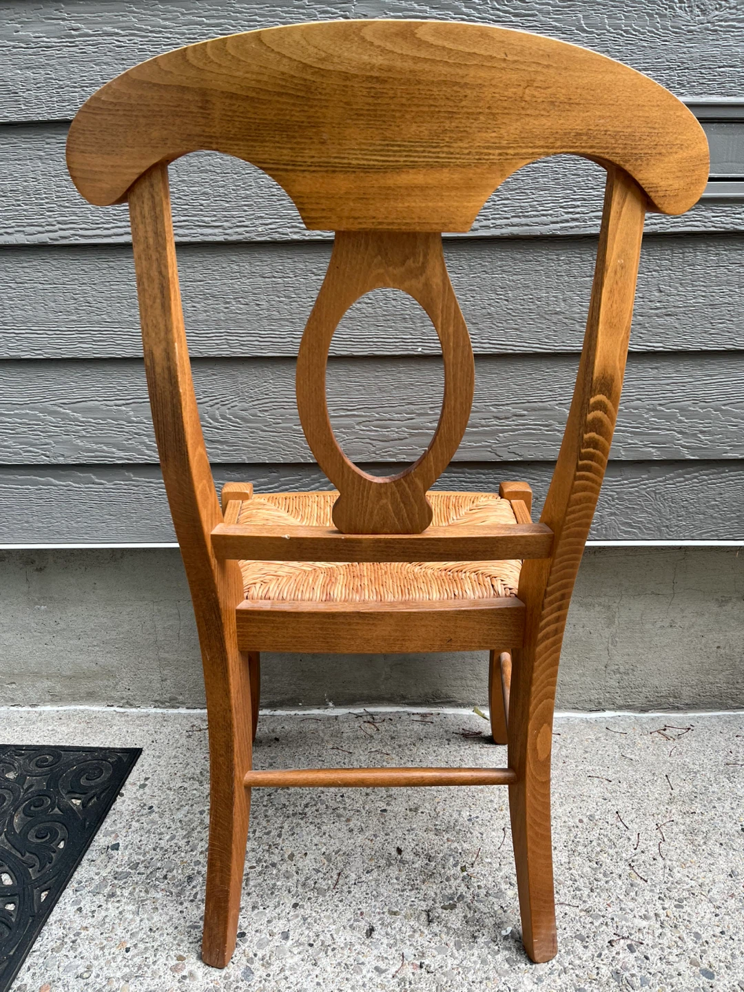 Wooden dining chair with rush seat