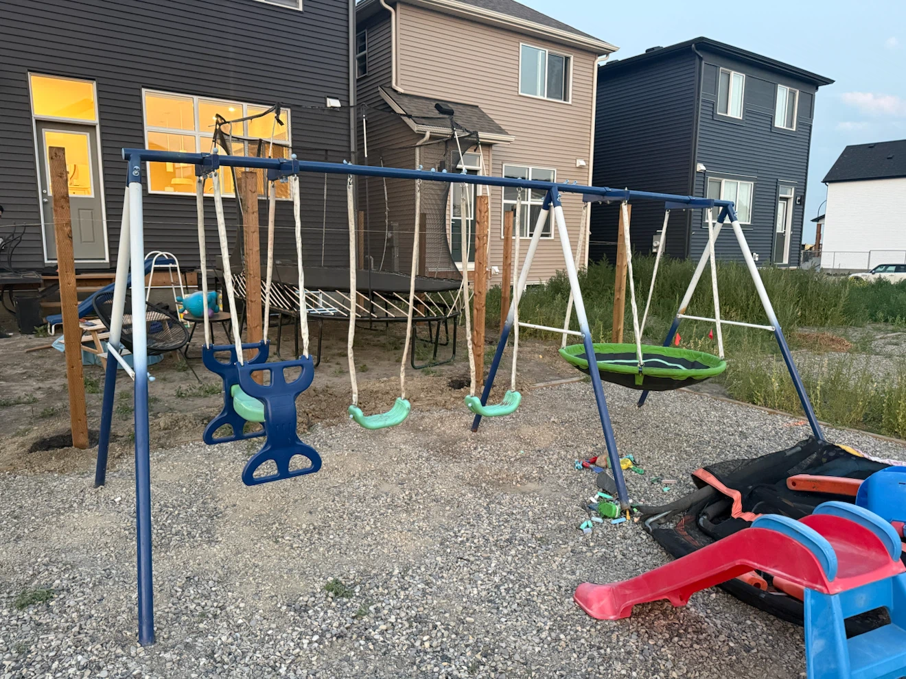 Swing set, small trampoline, Littlered slide and baby swing