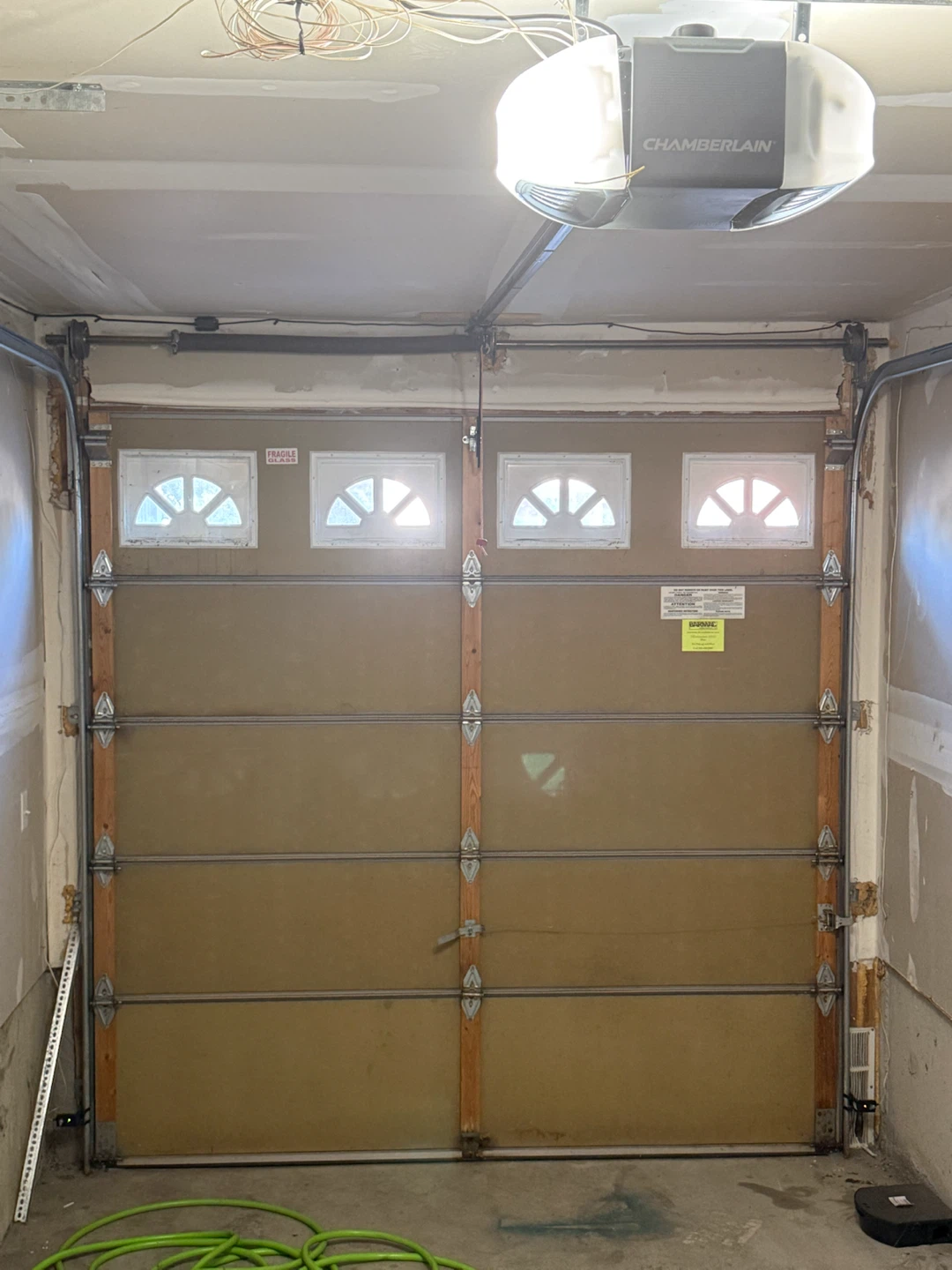 Garage door good condition with complete setup including spring