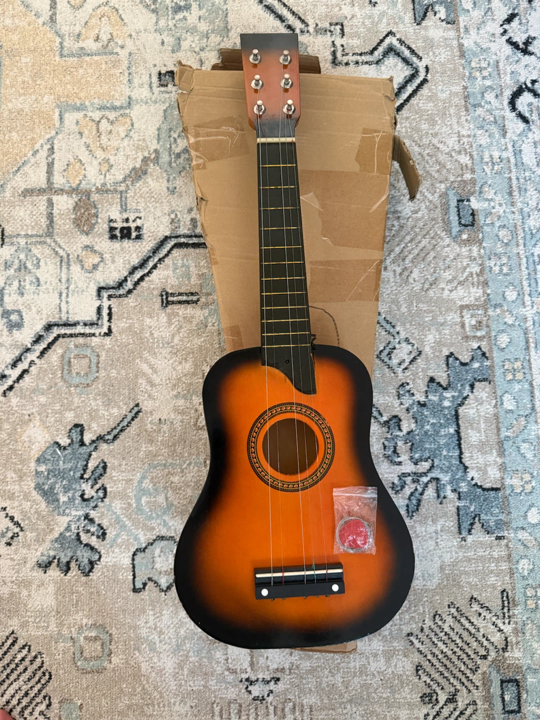 4 String Ukulele with Pick