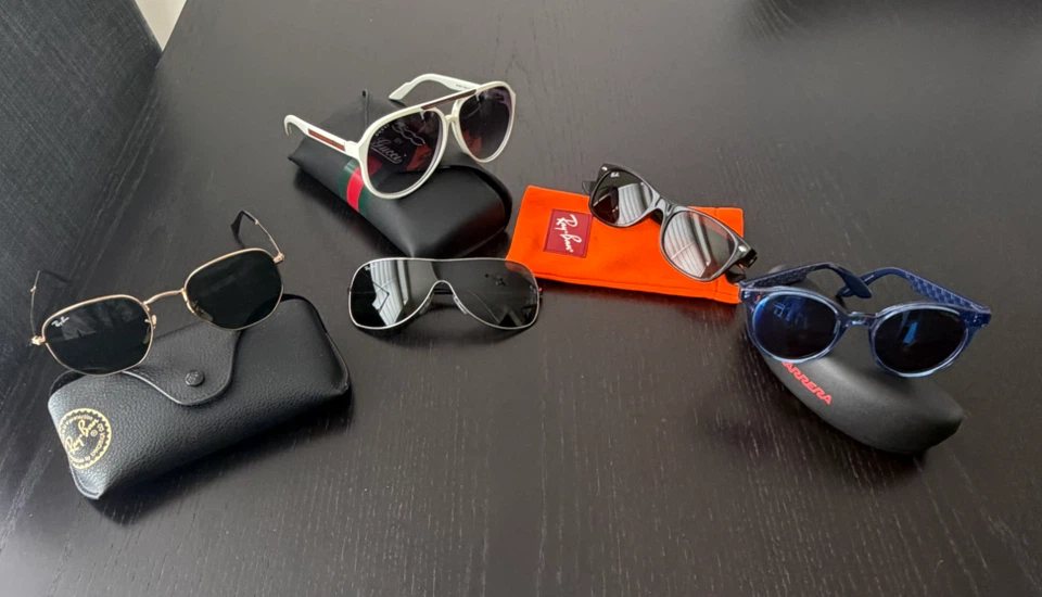Assorted Sunglasses: Ray-Ban, Gucci, Carrera