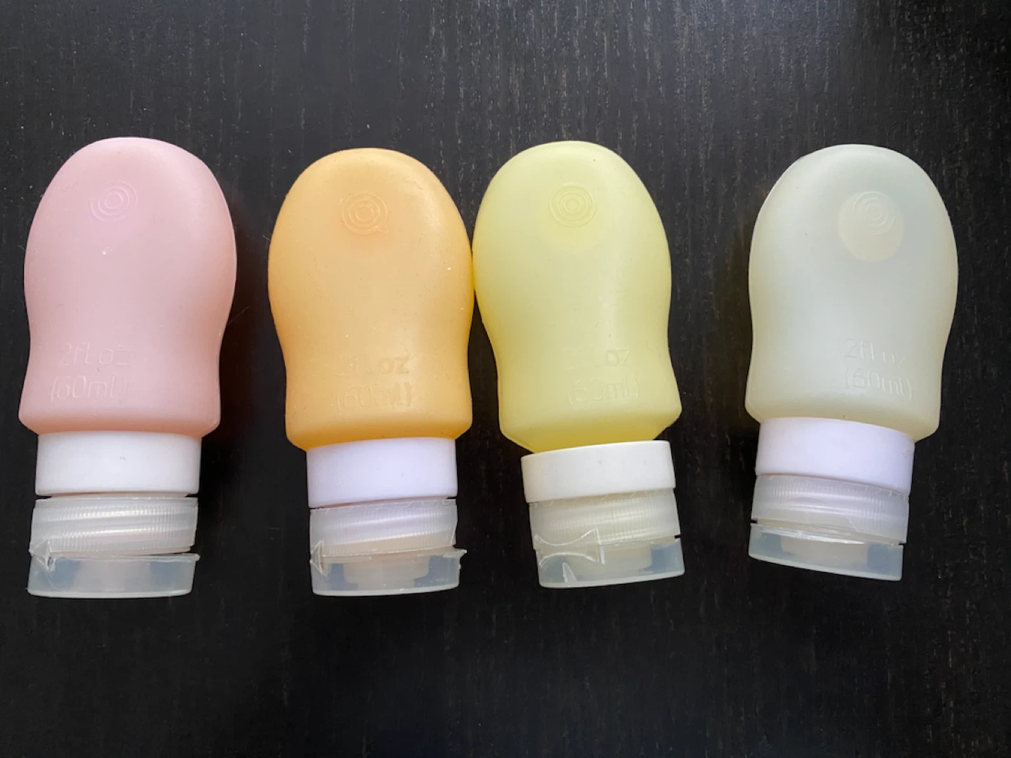Set of 4 Travel Size Silicone Bottles 2oz