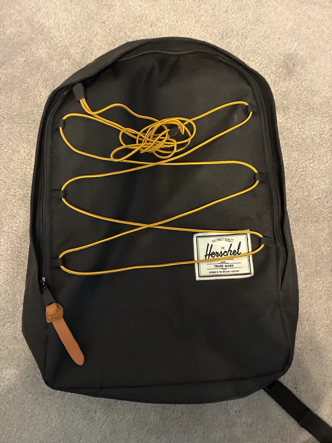 Herschel Black Backpack with Yellow Bungee Cord