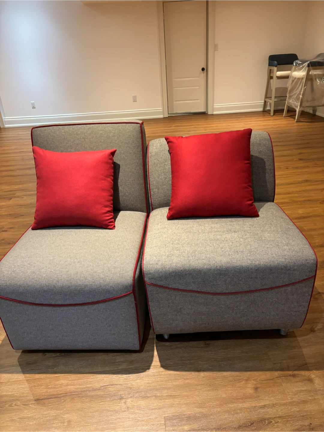 2 NEW Grey fabric accent chairs with red piping