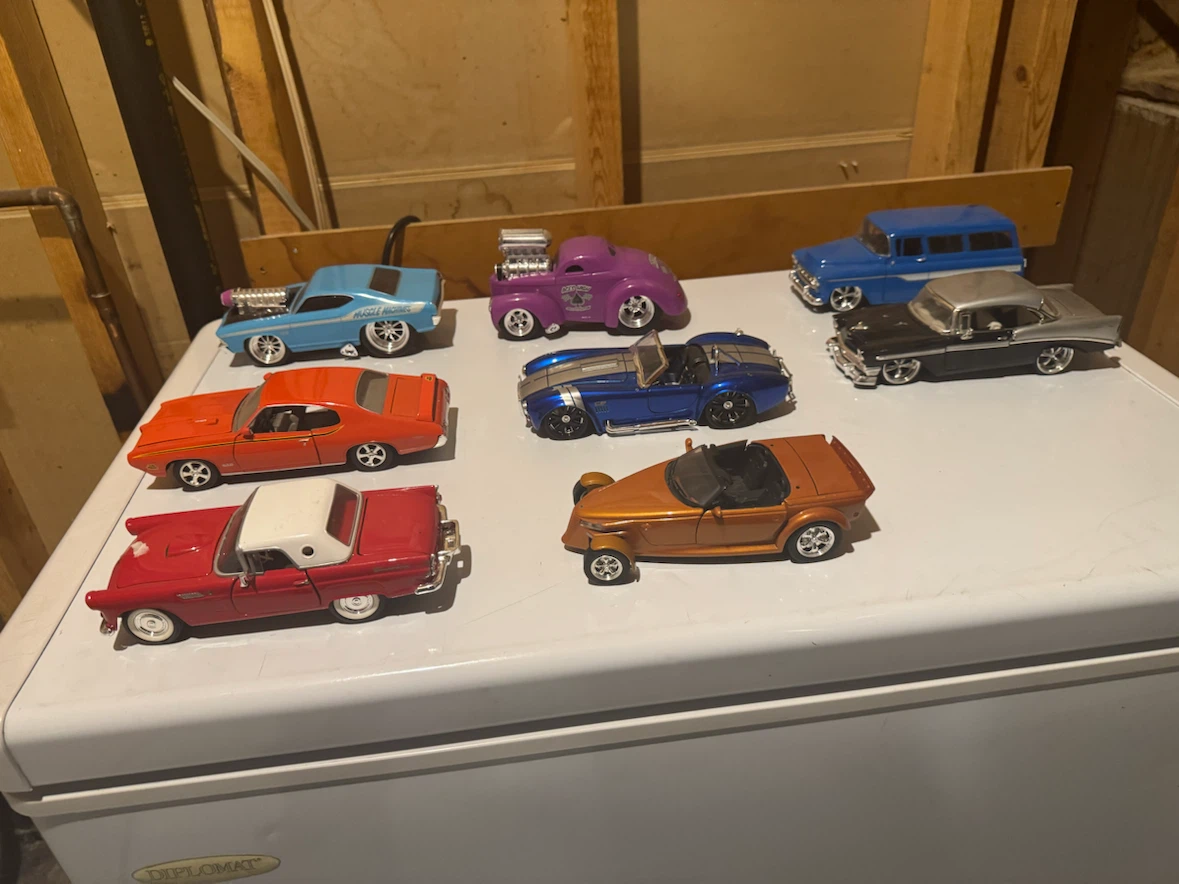 8 Diecast Cars. 1/24th scale.
