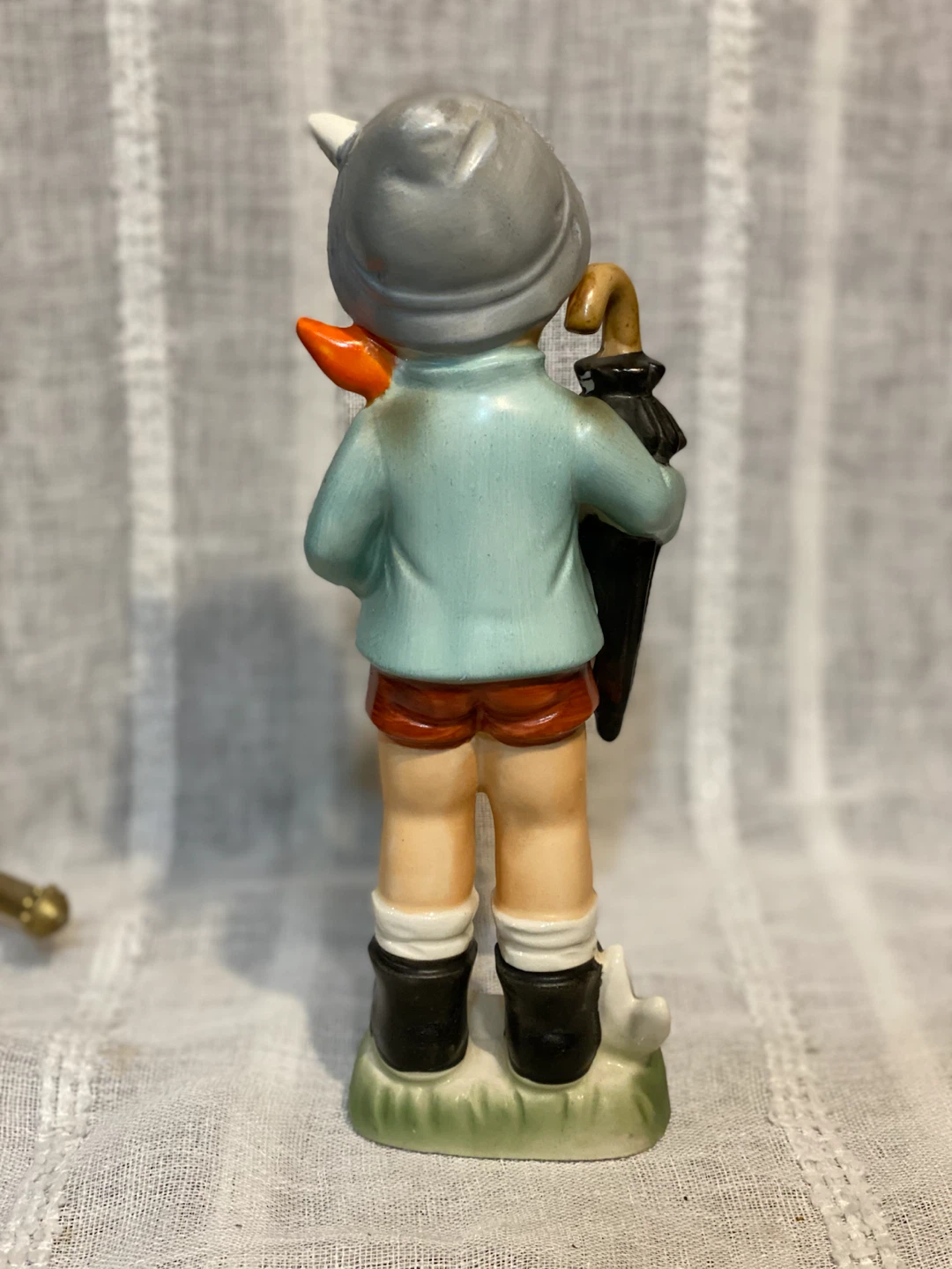 Vintage Ceramic Figurine of a Boy with Umbrella - photo 2