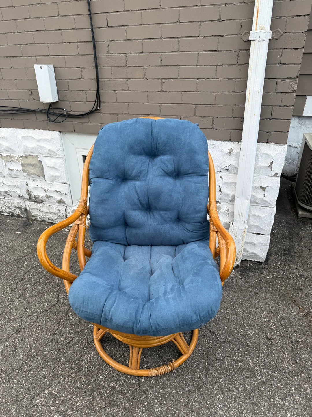 Rattan Swivel Chair with Blue Cushion